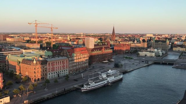 Malm&ouml; skyline and centralstation located next to a canal