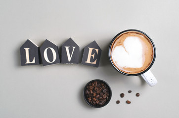 Love Cozy Concept, Cup of Coffee with Foam in Shape of Heart on Bright Beige Background