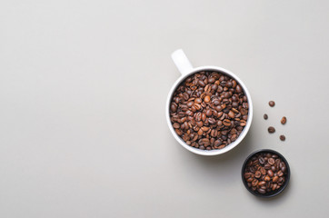 Coffee Beans Mug on Bright Beige Background