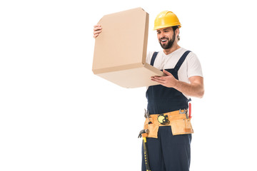 happy workman in hard hat and tool belt opening pizza box isolated on white