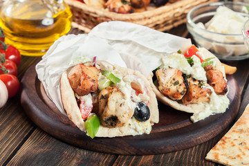 Gyros souvlaki wrapped in a pita bread