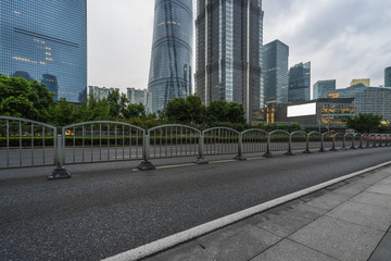 empty urban road with modern building in the city.