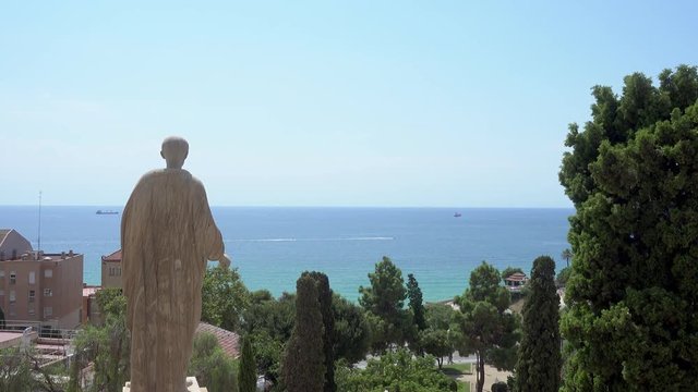 Statue of Augustus Caesar contemplating the mediterranean sea. Part of The Archaeological Ensemble of Tarraco, declared a UNESCO World Heritage Site Ref 875. Copy space. Space for text
