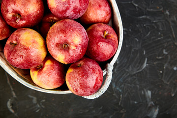 Fresh organic red apples in a basket
