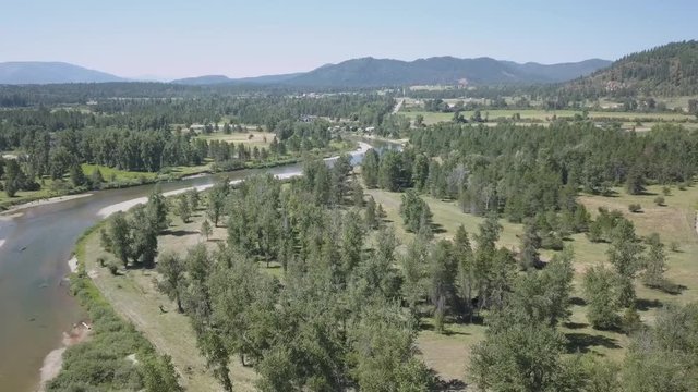 Aerial View of River Foothills and Farmland Panning Right - Priest River Idaho