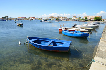 Fototapeta na wymiar Small harbor of the sea village Marzamemi, Sicily, Italy