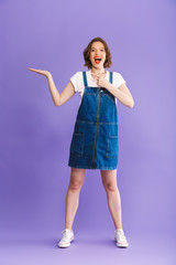 Full length portrait of a happy young woman