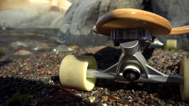 Longboard promotion at the rocky beach in Norway at Kjerringvik