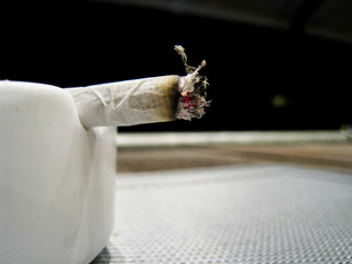 burn cigarettes on ashtray.