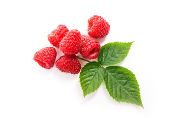 Ripe raspberries with leaf isolated on white background.
