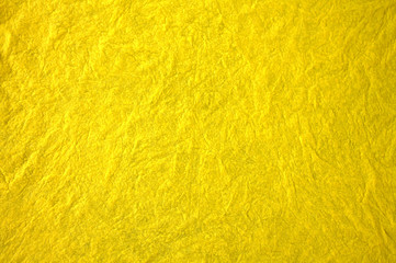 Texture of mint yellow fabric.