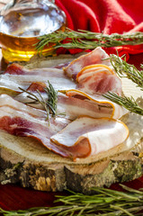 strips of fresh bacon on a board
