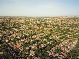 Aerial view urban sprawl near downtown Dallas, Texas, USA. Suburban tightly packed homes...