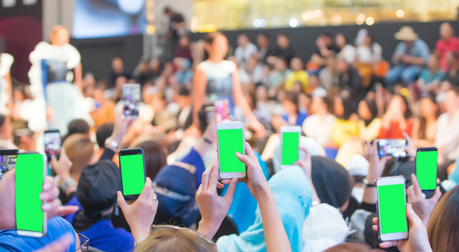 Front Row VIP Guests People From Audience Filming Vdo Fashion Show With Mobile Smart Phone