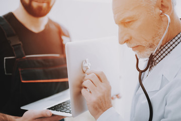 Computer Doctor in White Uniform with Stethoscope.