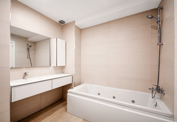 Modern bathroom interior with  bathtub. Clean and fresh bathroom.