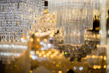 Background of glitter, colorful bokeh, chandeliers, crystal, chandelier , Emphasis on luxury, used in various places such as palace church, residence.