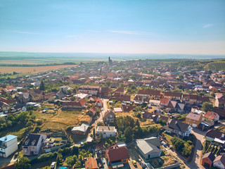 Obraz premium Aerial view of countryside with city and blue sky, Czech Republic