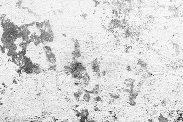 Wall fragment with scratches and cracks