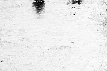 Wall fragment with scratches and cracks