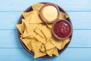 Crispy chips nachos with tomato and cheese sauce