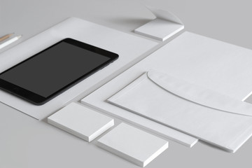 blank stationery items with a tablet