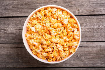 Yellow cheese popcorn in bowl