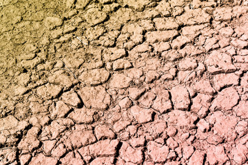 Cracked dry land during a drought, long time without rain, Infertile soil no plants.