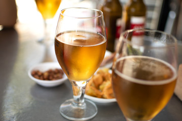 Beer glasses with plates to eat