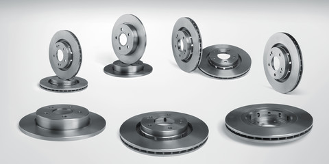 Set of brake discs on white background, car parts