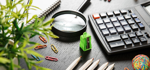 Back to school concept. School and office supplies on office table