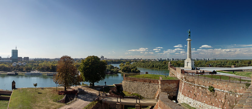 Kalemegdan fortress and Victor monument Belgrade, Usce Sava and Danube confluence view at sunny summer day, blue sky with small white clouds