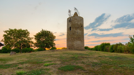 sunset with medival guard tower