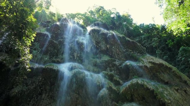 Tumalog falls in the Philippines southeast Asia pan up slowmotion
