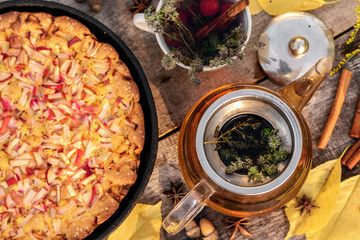 Homemade bakery pastry apple pie pies on wooden table. Autumn breakfast with tea and apple pie.