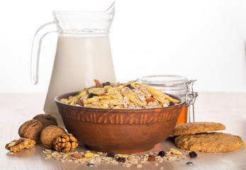 Raw oats in bowl and fruit