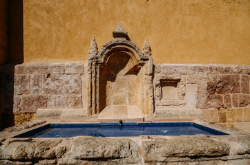 Ancient fountain at La Mezquita Cathedral complex in Cordoba, Spain - UNESCO World Heritage Site