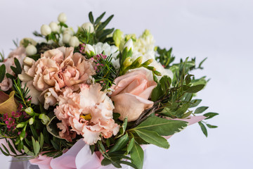 Flat lay of a beautiful florish bouquet composition on white background