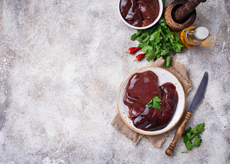 Raw uncooked  liver and spices for cooking 