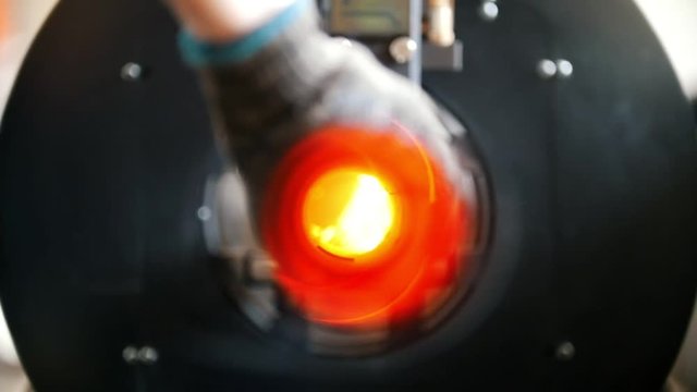 The grinder cuts the tube, a lot of sparks, there is a circular rotation