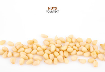 Peeled pine nuts on a white background. Healthy food. Nuts.