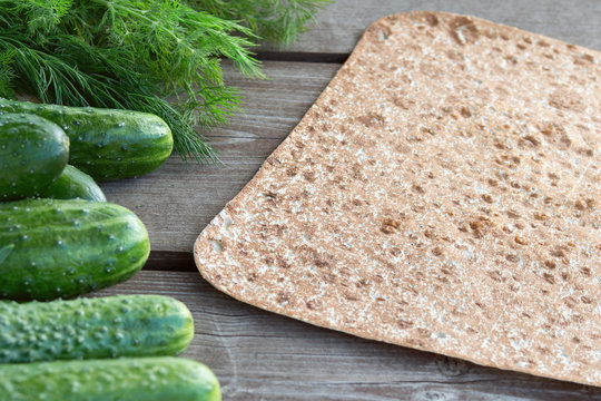Pitta bread with green-stuff vegatables during summer barbecue with copyspace. Concept of healthy food outdoors