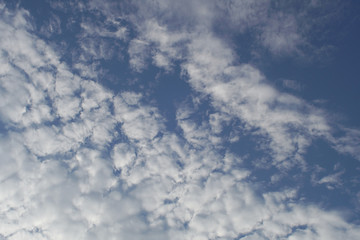 White clouds on a light blue sky