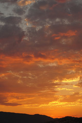 Orange cloudy sky during a sunset