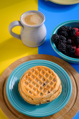 Waffles with raspberries and blackberries for breakfast
