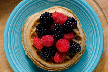 Waffles with raspberries and blackberries for breakfast