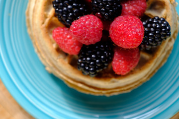 Waffles with raspberries and blackberries for breakfast