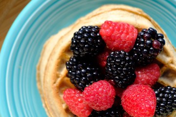 Waffles with raspberries and blackberries for breakfast