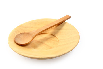 Wooden plate and teaspoon isolated clipping path.