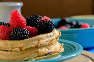 Waffles with raspberries and blackberries for breakfast